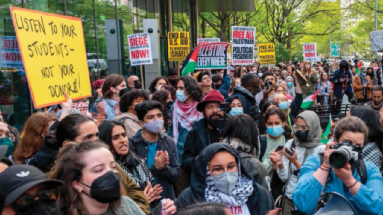 NEW YORK, NEW YORK - MAY 03: Pro Palestinian protesters gather outside of New York University (NYU) ...