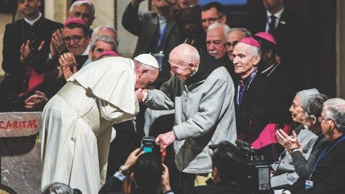 (FILES) In this file photo taken on March 31, 2019 Pope Francis (C-L) bends to kiss the hand of ...