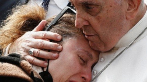 Serena Subania reacts while she hugs Pope Francis after she lost her five-year-old child Angelica, ...