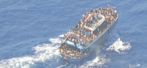 A undated handout photo provided by the Hellenic Coast Guard shows migrants onboard a boat during a ... A undated handout photo provided by the Hellenic Coast Guard shows migrants onboard a boat during a ...