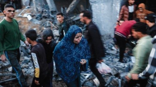 EDITORS NOTE: Graphic content / Palestinians check the damages after an Israeli strike in Rafah in ... EDITORS NOTE: Graphic content / Palestinians check the damages after an Israeli strike in Rafah in ...