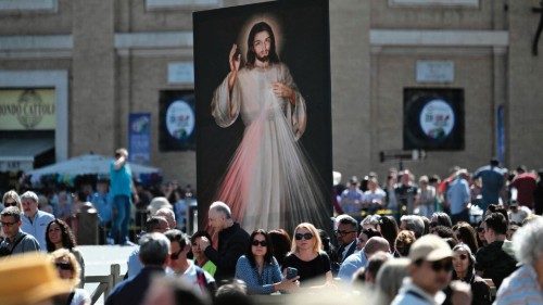 People hold an icon of Jesus Christ at St. Peter's square before Pope Francis Regina Coeli prayer on ... People hold an icon of Jesus Christ at St. Peter's square before Pope Francis Regina Coeli prayer on ...