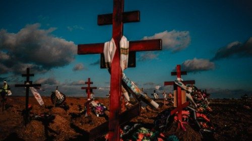 TOPSHOT - Memprial crosses are seen on the new graves at a cemetery in the southern city of Kherson ...