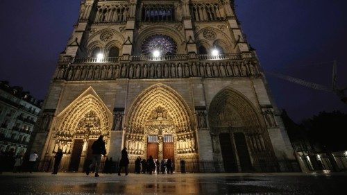 People arrive to attend a second mass, open to the public, at the Notre-Dame de Paris cathedral on ... People arrive to attend a second mass, open to the public, at the Notre-Dame de Paris cathedral on ...