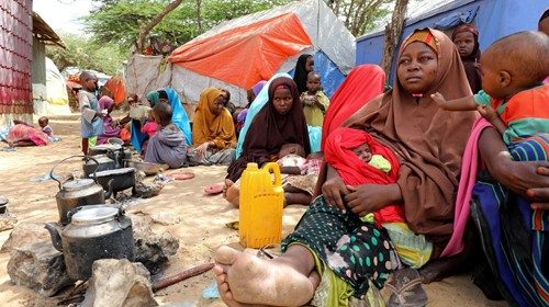 Somali families, displaced after fleeing the Lower Shabelle region, rest at an IDP camp near Mogadishu, Somalia, 12 March, 2020. (REUTERS)