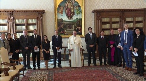 Pope Francis poses with experts of Moneyval after a meeting with the Committee of Experts of the ...