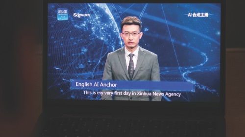 This photo illustration shows a man watching an artificial intelligence (AI) news anchor from a ...