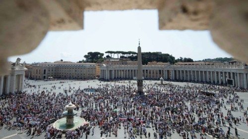 People gather at Saint Peter's Square for the Angelus prayer at the Vatican August 22, 2021.   ...