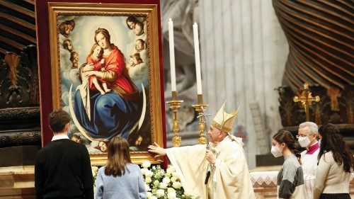 Pope Francis looks at a painting after Mass for the Solemnity of Christ the King in St. Peter's ...