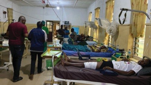 Victims of the bomb attack during a Catholic mass at St. Francis Catholic church receive treatment ...