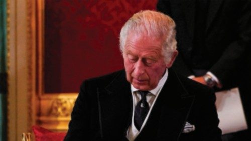 Britain's King Charles III signs an oath to uphold the security of the Church in Scotland, during a ...