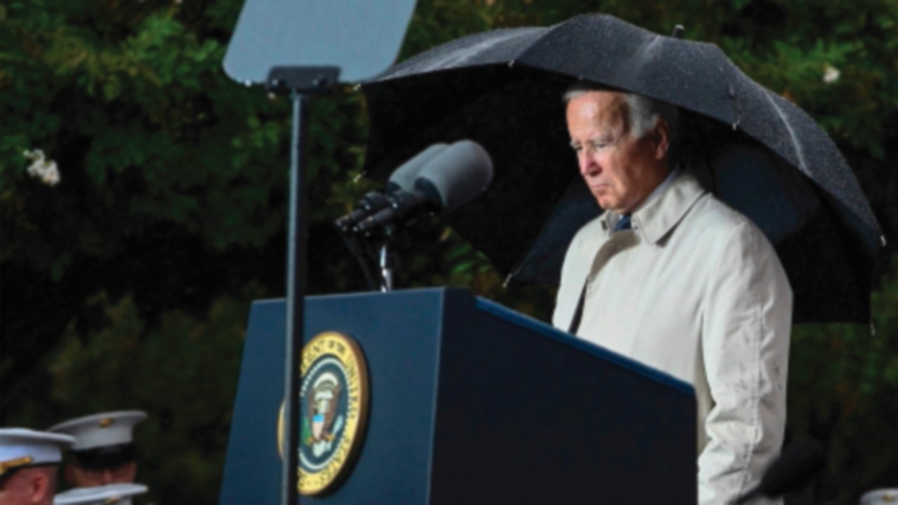 (L-R) US President Joe Biden, US Defense Secretary Lloyd Austin, and Chairman of the Joint Chiefs of ...