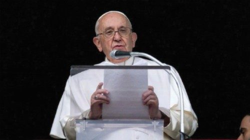 A handout picture provided by the Vatican Media shows Pope Francis delivering the Angelus prayer in ...