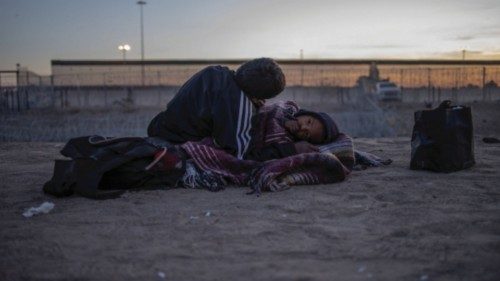 The U.S. border wall is seen in the background as Victor, a 13 year old migrant from Venezuela, ... The U.S. border wall is seen in the background as Victor, a 13 year old migrant from Venezuela, ...