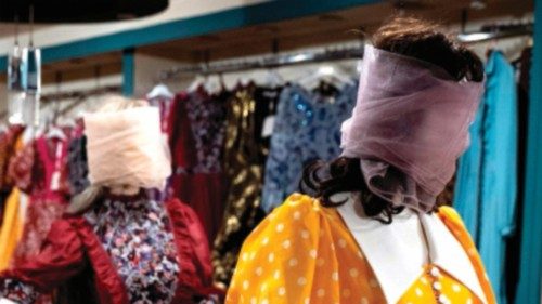 This photograph taken on July 22, 2024, shows veiled mannequins dressed in women's attire, at a shop ...