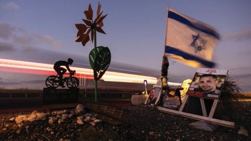 An Israeli flag flutters, near the site at which Ron Benjamin was slain by Hamas, nearly a year ... An Israeli flag flutters, near the site at which Ron Benjamin was slain by Hamas, nearly a year ...
