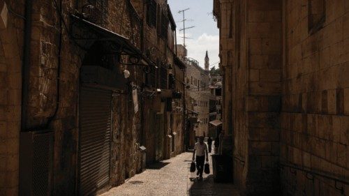 A man carries groceries down an empty alley in the Old City of Jerusalem on June 23, 2025, as shops ... A man carries groceries down an empty alley in the Old City of Jerusalem on June 23, 2025, as shops ...