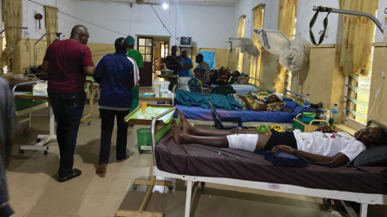 Victims of the bomb attack during a Catholic mass at St. Francis Catholic church receive treatment ...