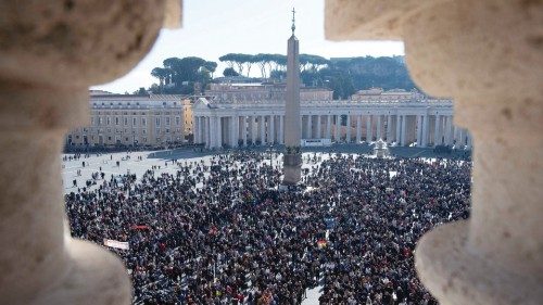 People attend the Angelus prayer lead by Pope Francis at the Vatican, February 12, 2023. Divisione ...