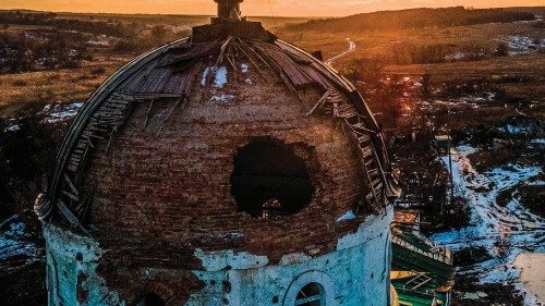 This aerial photograph shows a damaged church, which was used by Russian troops as a makeshift ...