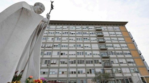 A view shows a statue of late Pope John Paul II at the main entrance of Gemelli hospital on March ...