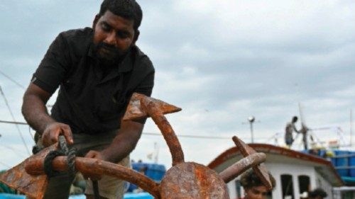 A fisherman prepares to set sail for fishing at the Kasimedu fishing harbour in Chennai on June 13, ... A fisherman prepares to set sail for fishing at the Kasimedu fishing harbour in Chennai on June 13, ...