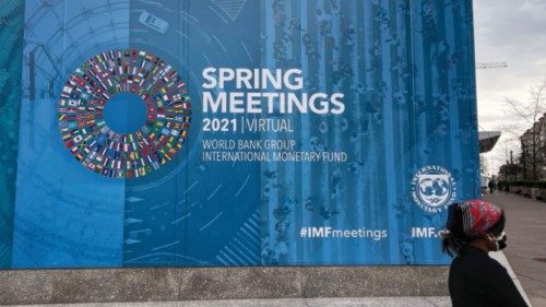 A sign is seen on April 1,2021 at the International Monetary Fund (IMF) building to announce the ...