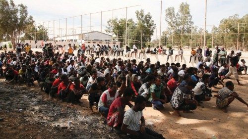 Migrants gather at a detention center at Ain Zara, in Tripoli, Libya October 12, 2021. REUTERS/Hazem ...