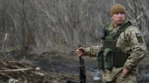 A Ukrainian service member is seen on the front line near the city of Novoluhanske in the Donetsk ...