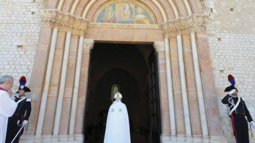 Pope Francis enters the Basilica of Santa Maria di Collemaggio during the opening of the Holy Door ...