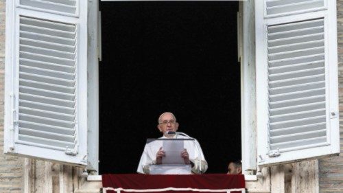 A handout picture provided by the Vatican Media shows Pope Francis delivering the Angelus prayer in ...