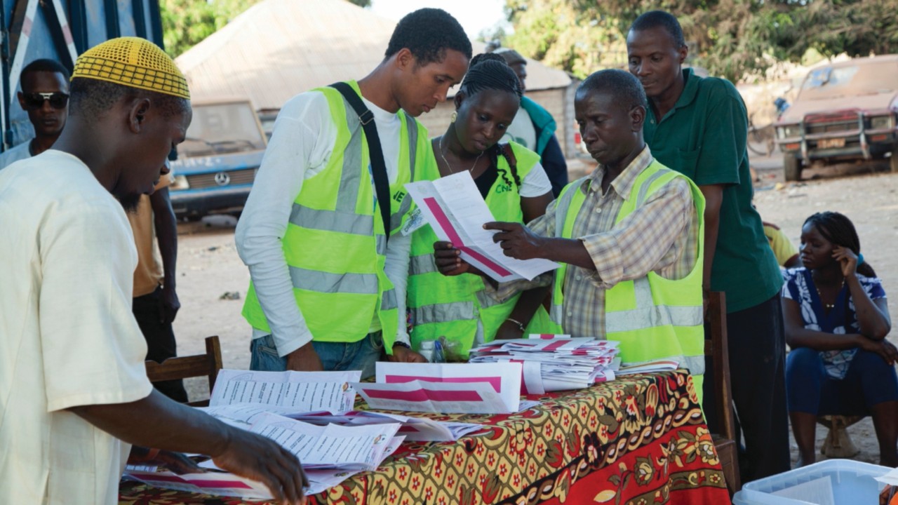 Gabu, Guinea-Bissau - April 13, 2014: Polling station, ballot boxes and international election ...