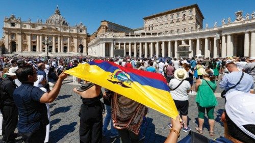 Faithful with an Ecuador flag attend the Angelus prayer held by Pope Francis (not pictured) in St. ...
