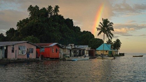 FILE PHOTO: Local resident Tarusila Boseiwaqa walks along a sea wall at Serua Village, Fiji, July ... FILE PHOTO: Local resident Tarusila Boseiwaqa walks along a sea wall at Serua Village, Fiji, July ...