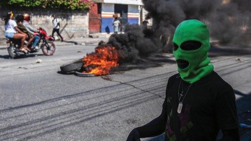 epa11192516 A hooded man is seen on the streets, in Port-au-Prince, Haiti, 01 March 2024, a day ... epa11192516 A hooded man is seen on the streets, in Port-au-Prince, Haiti, 01 March 2024, a day ...