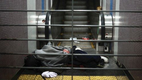 A homeless person sleeps near the escalator of a subway station, in Buenos Aires, Argentina, May 30, ... A homeless person sleeps near the escalator of a subway station, in Buenos Aires, Argentina, May 30, ...