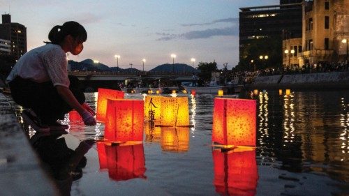 People release paper lanterns on the Motoyasu River beside the Hiroshima Prefectural Industrial ... People release paper lanterns on the Motoyasu River beside the Hiroshima Prefectural Industrial ...