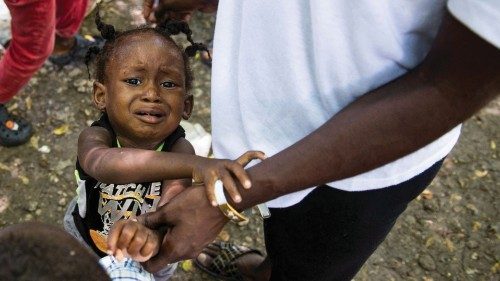A child reacts as families displaced from their homes after a deadly attack by members of the Gran ... A child reacts as families displaced from their homes after a deadly attack by members of the Gran ...