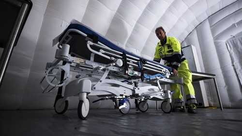 Assembly of tensile structures for pre-triage, in the event that there is a higher inflow due to ... Assembly of tensile structures for pre-triage, in the event that there is a higher inflow due to ...