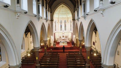 epa08333902 Fr. Martin Cosgrove saying mass to an empty Church of the Annunciation Catholic Church ...