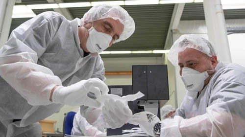 Employees of Zender Germany GmbH textile company, an automotive supplier, make protective masks to ... Employees of Zender Germany GmbH textile company, an automotive supplier, make protective masks to ...