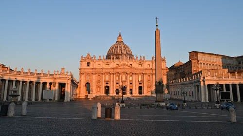 A general view taken at sunrise on April 11, 2020 shows Italian state police cars standing guard at ...