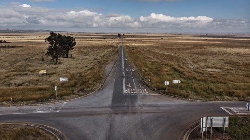 This aerial view taken on April 29, 2020, shows a deserted crossroads in the middle of farmland near ... This aerial view taken on April 29, 2020, shows a deserted crossroads in the middle of farmland near ...