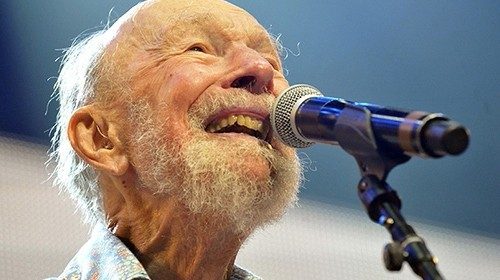 Pete Seeger performs on stage during the Farm Aid 2013 concert at Saratoga Performing Arts Center in ...