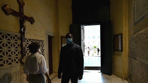 People enter to pray in Rome's Santa Maria in Trastevere church on May 3, 2020 during the country's ... People enter to pray in Rome's Santa Maria in Trastevere church on May 3, 2020 during the country's ...