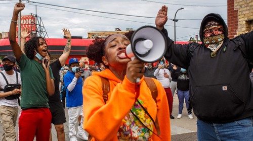 TOPSHOT - Protesters demonstrate against the death of George Floyd outside the 3rd Precinct Police ...