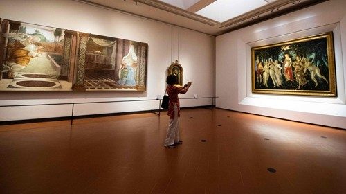 A journalist takes a photo of Sandro Botticelli's 'Primavera' (Spring) at the Uffizi Gallery Museum ...