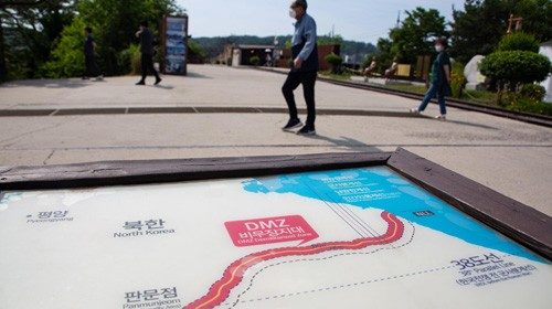 epa08489852 Visitors walk past a sign in Imjingak, near the Demilitarized Zone (DMZ) in Paju, ... epa08489852 Visitors walk past a sign in Imjingak, near the Demilitarized Zone (DMZ) in Paju, ...