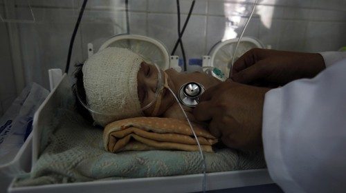 epa08518837 A Yemeni doctor checks up a premature-newborn baby lies inside an incubator in order to ...