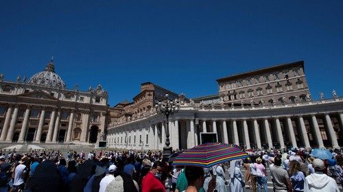 Faithful gather in St. Peter' Square at the Vatican on July 5, 2020 as Pope Francis leads the Sunday ...